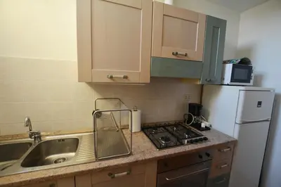 Cucina o angolo cottura di UNYCA - Florence cozy 3 bedroom Apartment 1