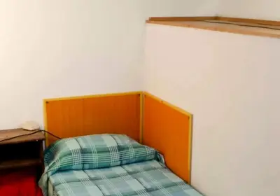 Letto o letti in una camera di UNYCA - Florence cozy 3 bedroom Apartment 2