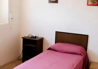 Letto o letti in una camera di UNYCA - Florence cozy 3 bedroom Apartment 2
