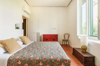 Letto o letti in una camera di Giusti Palace By San Firenze Collection