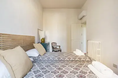 Letto o letti in una camera di Giusti Palace By San Firenze Collection