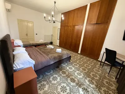 Letto o letti in una camera di Albizi Central Rooms