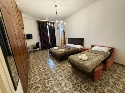 Letto o letti in una camera di Albizi Central Rooms