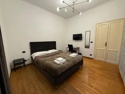 Letto o letti in una camera di Albizi Central Rooms