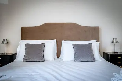 Letto o letti in una camera di YD Comfort & Style in Central Florence 3BR Apartment