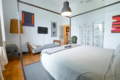 Letto o letti in una camera di Amicasa