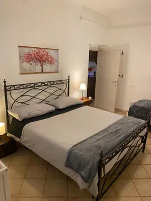 Letto o letti in una camera di Fortezza garden apartment