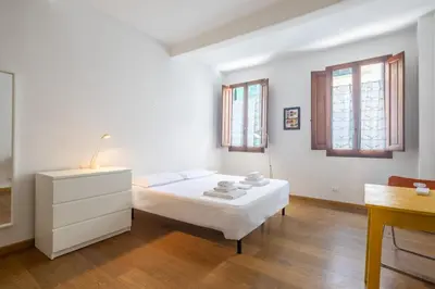 Letto o letti in una camera di Sant'Ambrogio 3-Bedroom Apartment