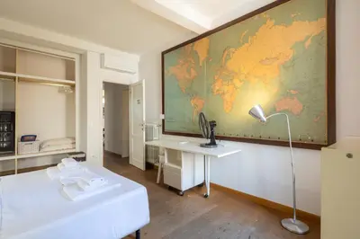 Letto o letti in una camera di Sant'Ambrogio 3-Bedroom Apartment