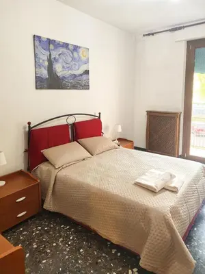Letto o letti in una camera di Dimora D'Arte - dove il viaggio sa di casa