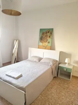 Letto o letti in una camera di Dimora D'Arte - dove il viaggio sa di casa