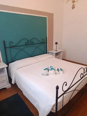 Letto o letti in una camera di Camera da letto Wilma