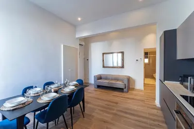 Letto o letti in una camera di UNYCA - Elegant 3-bedroom Apartment in Florence