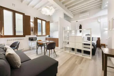 Area soggiorno di Deluxe Pitti Suites by MMega