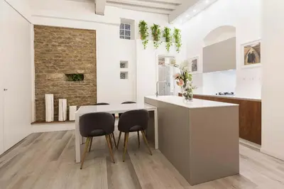 Cucina o angolo cottura di Deluxe Pitti Suites by MMega