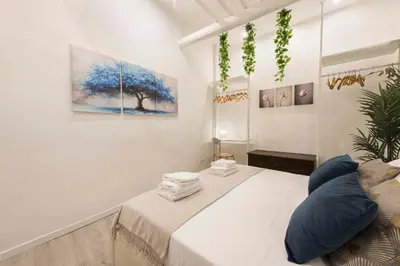 Letto o letti in una camera di Deluxe Pitti Suites by MMega