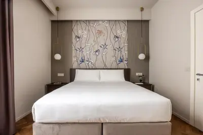 Letto o letti in una camera di ROOM 101 by Aramis