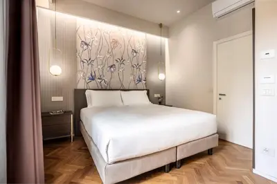 Letto o letti in una camera di ROOM 101 by Aramis