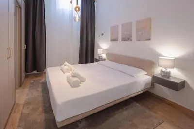 Letto o letti in una camera di Central Market 3-bedroom Design Apartment