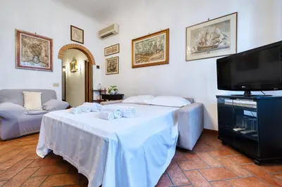 Letto o letti in una camera di Maggio - Boutique Home in Florence