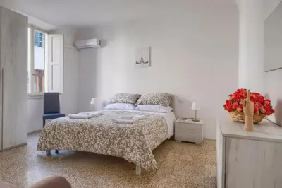 Letto o letti in una camera di Ridolfi's House