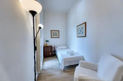 Letto o letti in una camera di Casella - Boutique Home in Florence