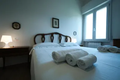 Letto o letti in una camera di Casella - Boutique Home in Florence