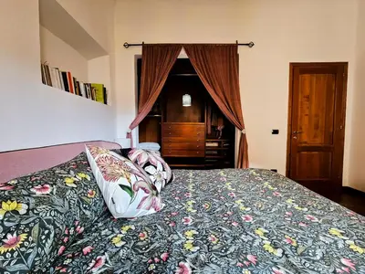 Letto o letti in una camera di Via Senese 25 at Porta Romana