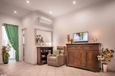 TV o dispositivi per l'intrattenimento presso Novella Benedicta Apartments