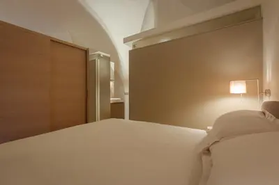 Letto o letti in una camera di Belvedere Costa San Giorgio loft amazing view