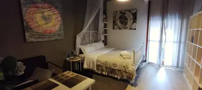 Letto o letti in una camera di Giulietta Rooms