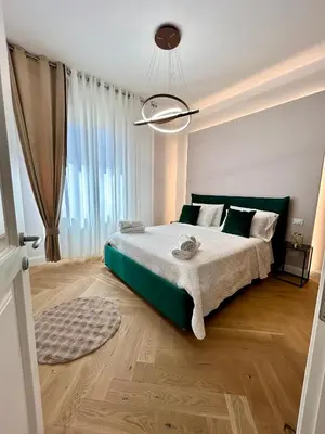 Letto o letti in una camera di Attico di lusso elegante e moderno