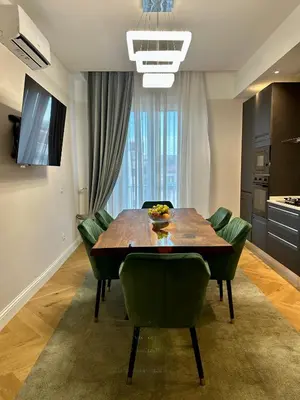 TV o dispositivi per l'intrattenimento presso Attico di lusso elegante e moderno