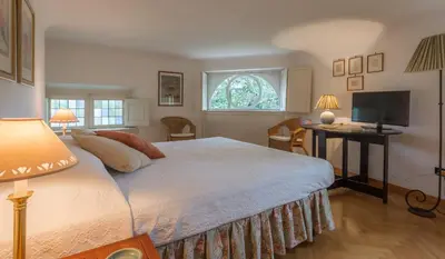 Letto o letti in una camera di Boboli Poggio Imperiale in charming villa