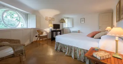 Letto o letti in una camera di Boboli Poggio Imperiale in charming villa