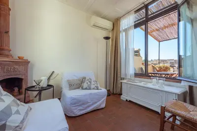 Letto o letti in una camera di Ponte Vecchio Penthouse charming view