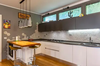 Cucina o angolo cottura di GuestHost - Modern Apartment with Large Terrace
