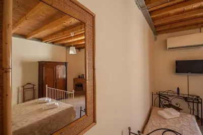 Letto o letti in una camera di Uffizi Dream