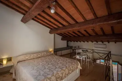 Letto o letti in una camera di Uffizi Dream