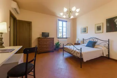 Letto o letti in una camera di Apartment BLU in Florence, Oltrarno - San Frediano