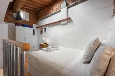 Letto o letti in una camera di MediciApt - Lorenzo suite