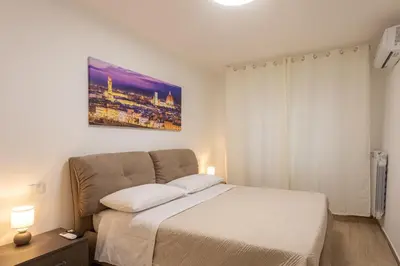 Letto o letti in una camera di Sara Home Flo