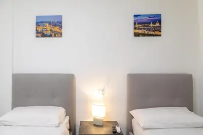 Letto o letti in una camera di Sara Home Flo