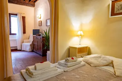 Letto o letti in una camera di Borgo Allegri Apartment