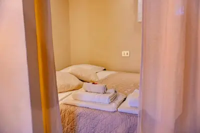 Letto o letti in una camera di Borgo Allegri Apartment