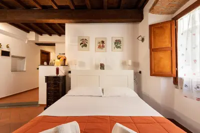Letto o letti in una camera di Keys of Italy- CorsoB-9- Studio by Palazzo Vecchio