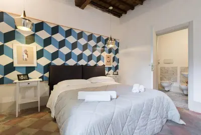 Letto o letti in una camera di Keys of Italy -F3-Santa Croce one bedroom flat