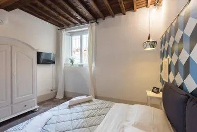 Letto o letti in una camera di Keys of Italy -F3-Santa Croce one bedroom flat