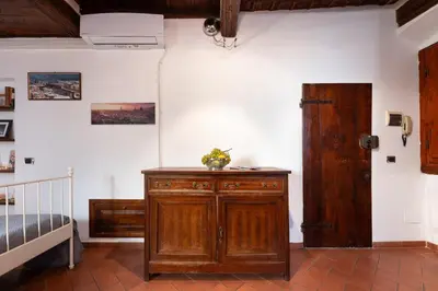 Letto o letti in una camera di Keys of Italy-CorsoS-9-Studio by Palazzo Vecchio
