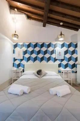 Letto o letti in una camera di Keys of Italy -F5 Santa Croce one bedroom flat